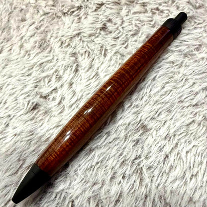 Siamese rosewood wood pen with lacquer finish showing micro-curry grain pattern by Brand