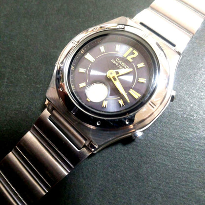 Casio Wave Ceptor solar radio wave ladies watch with black band and round digital-analog dial