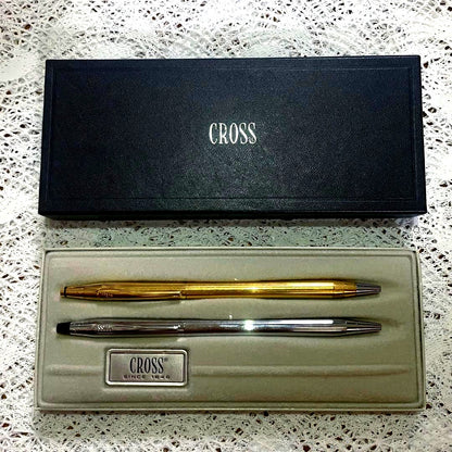 Set of two Cross ballpoint pens with 0.5mm refill, silver USA pen and gold Ireland pen in box, used condition