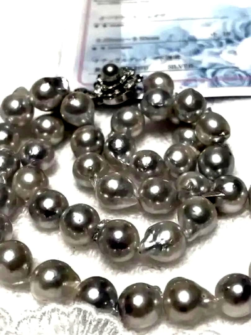 High-quality Akoya baroque pearl in blue-gray color measuring 9.5 to 9 mm with certificate