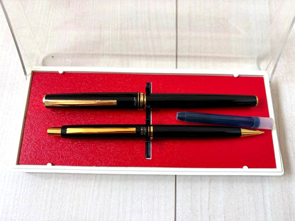 Pilot fountain pen and mechanical pencil set F-B with original box, showing slight aging and gold faded cap