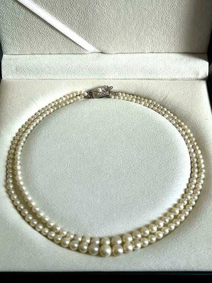 Akoya pearl gradient double necklace with silver clasp featuring white pearls ranging from 3 to 8 mm