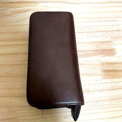 Brown leather Pilot pen case with zipper holding three pens and one pocket