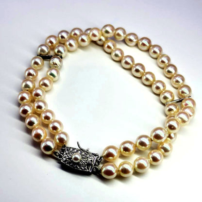 Tasaki silver 2-strand bracelet with approximately 6.0-6.2mm pearls measuring about 19cm