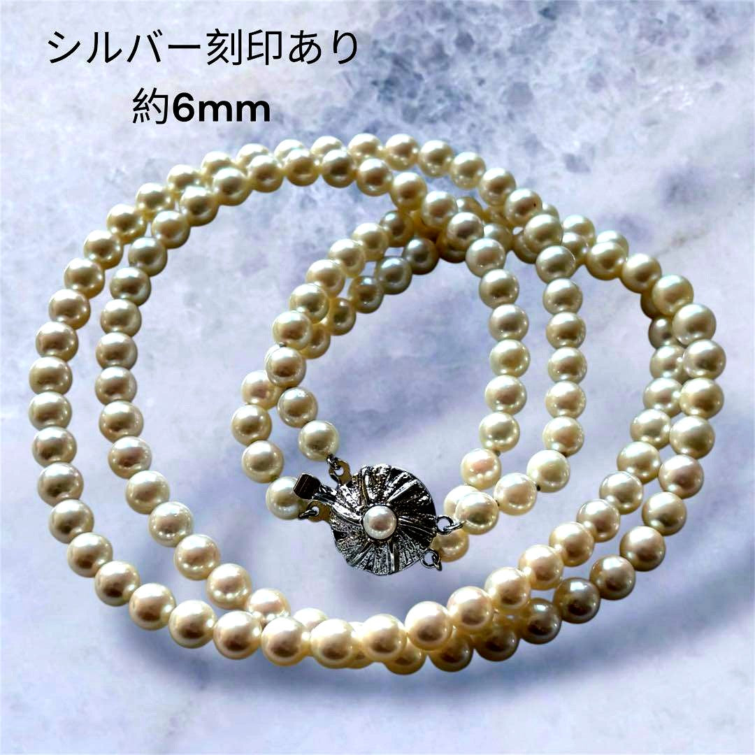 Honmono Pearls two-strand necklace featuring 6mm round white pearls on a 42.5 cm length strand