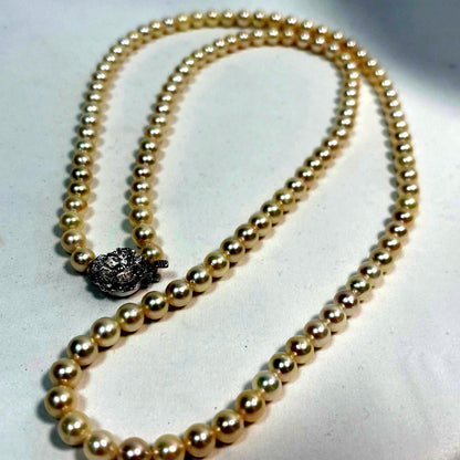 Akoya pearl long necklace with silver flower pendant, white pearls 6.5 to 7 mm, 82 cm length