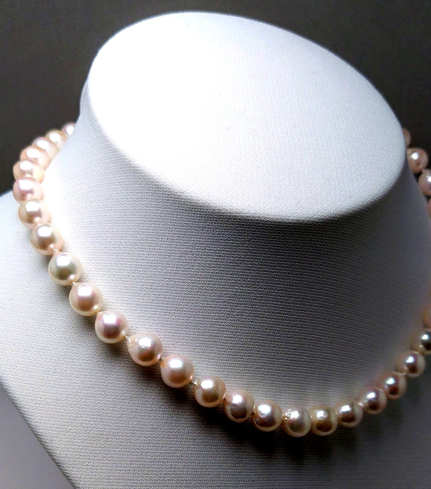 Akoya pearl necklace featuring 9.0-8.5mm white pink semi baroque pearls with unique indentations and good luster