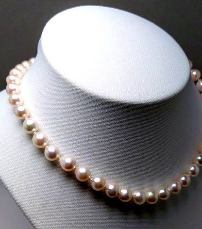 Akoya pearl necklace featuring 9.0-8.5mm white pink semi baroque pearls with unique indentations and good luster