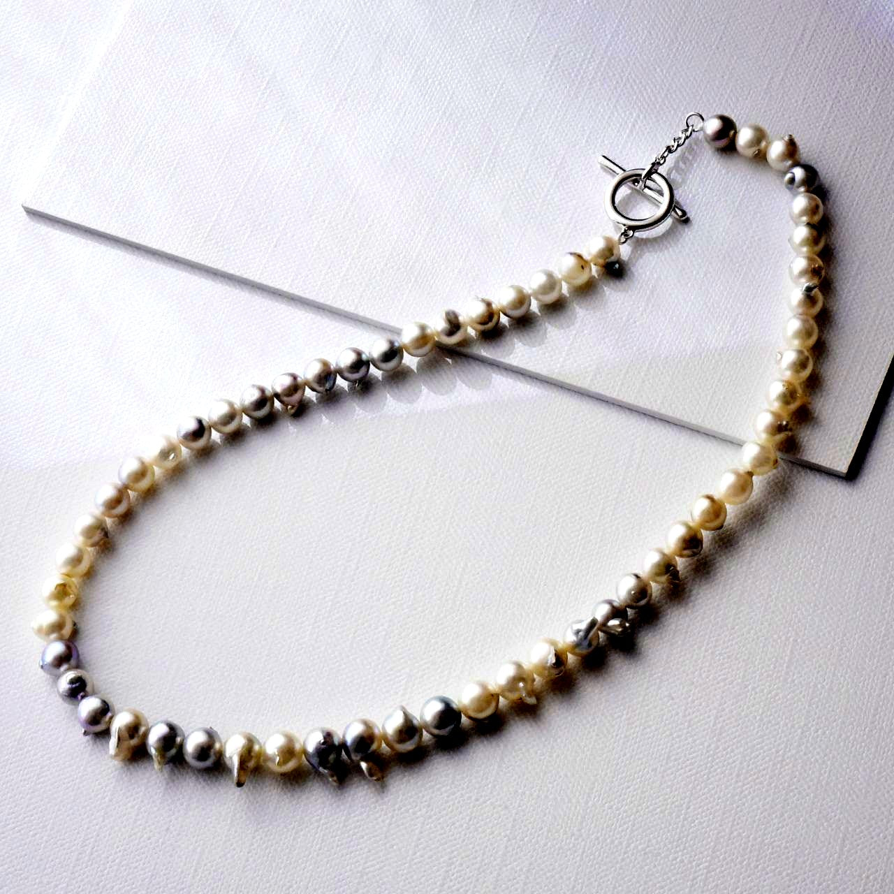 Akoya pearl baroque necklace featuring natural color pearls sized 6-8mm on a 42cm chain with rhodium-plated clasp
