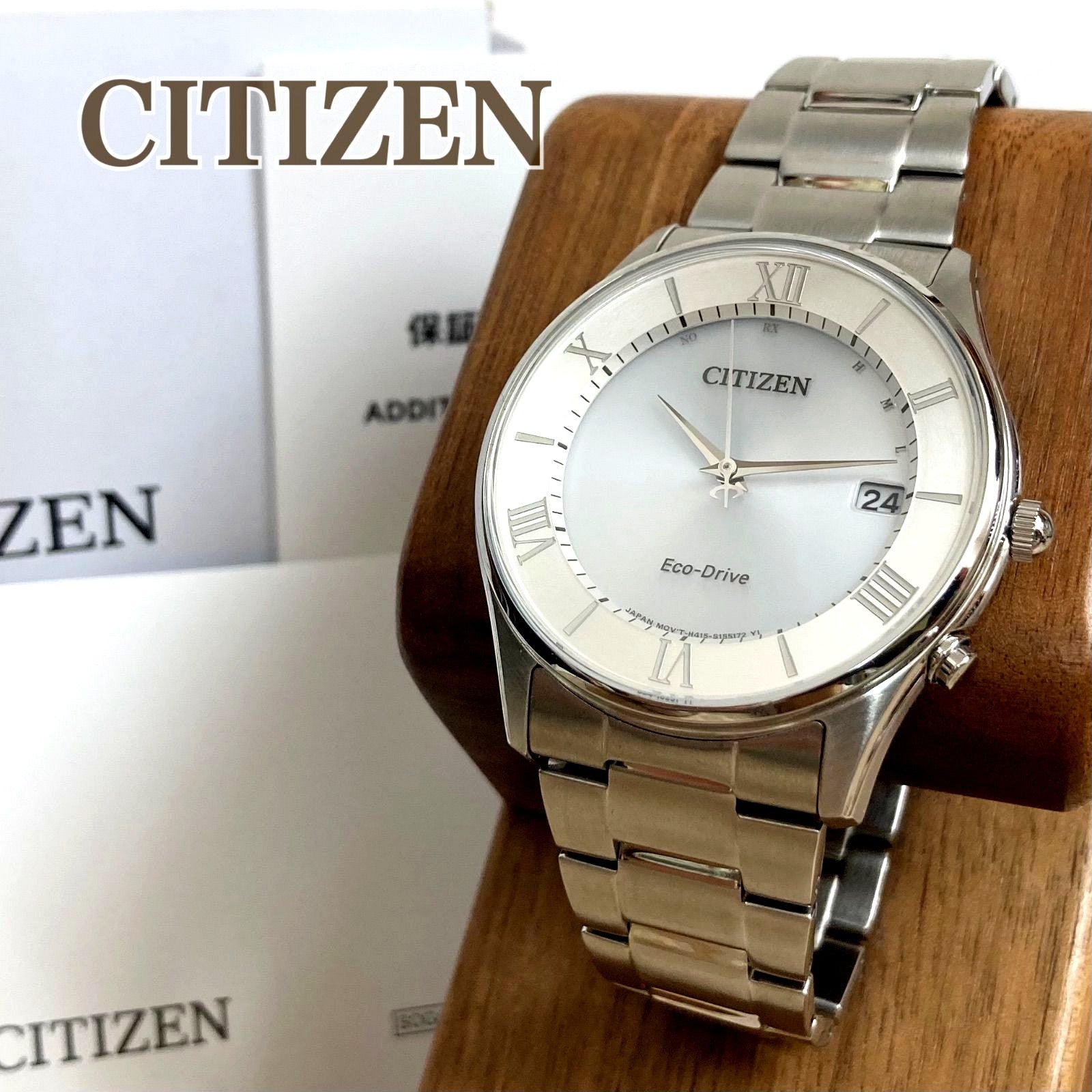 Citizen Eco-Drive men's radio-controlled watch model H415-S112907 with silver case and black band
