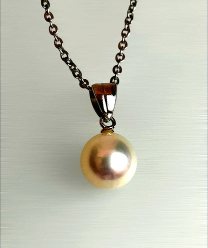 Akoya pearl necklace with a single 8.5mm white pearl on a silver chain
