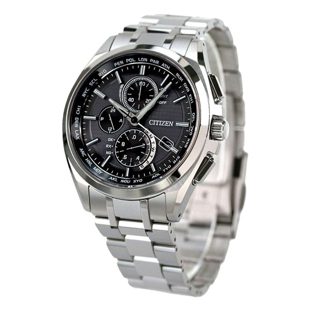 Citizen Attesa AT8040-57E watch with black dial and silver titanium band on a white background