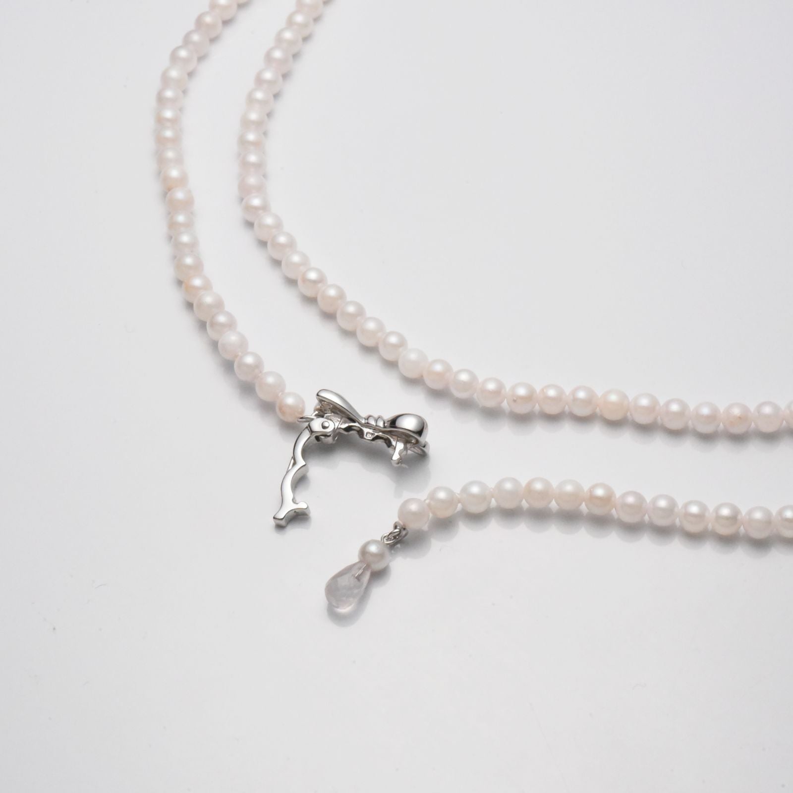 Akoya cultured pearl necklace 3.5-4mm with briolette rose quartz and ribbon clasp on an 80 cm strand