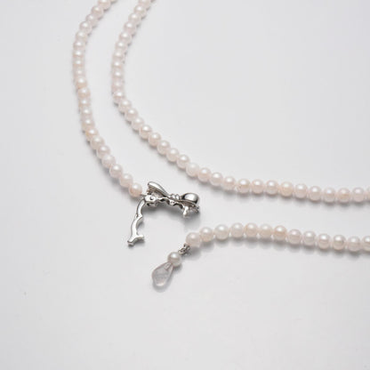 Akoya cultured pearl necklace 3.5-4mm with briolette rose quartz and ribbon clasp on an 80 cm strand