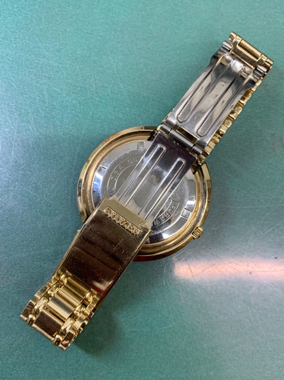 Citizen CRYSTAL SEVEN CUSTOM 6-251684 automatic wristwatch with gold dial showing time and date