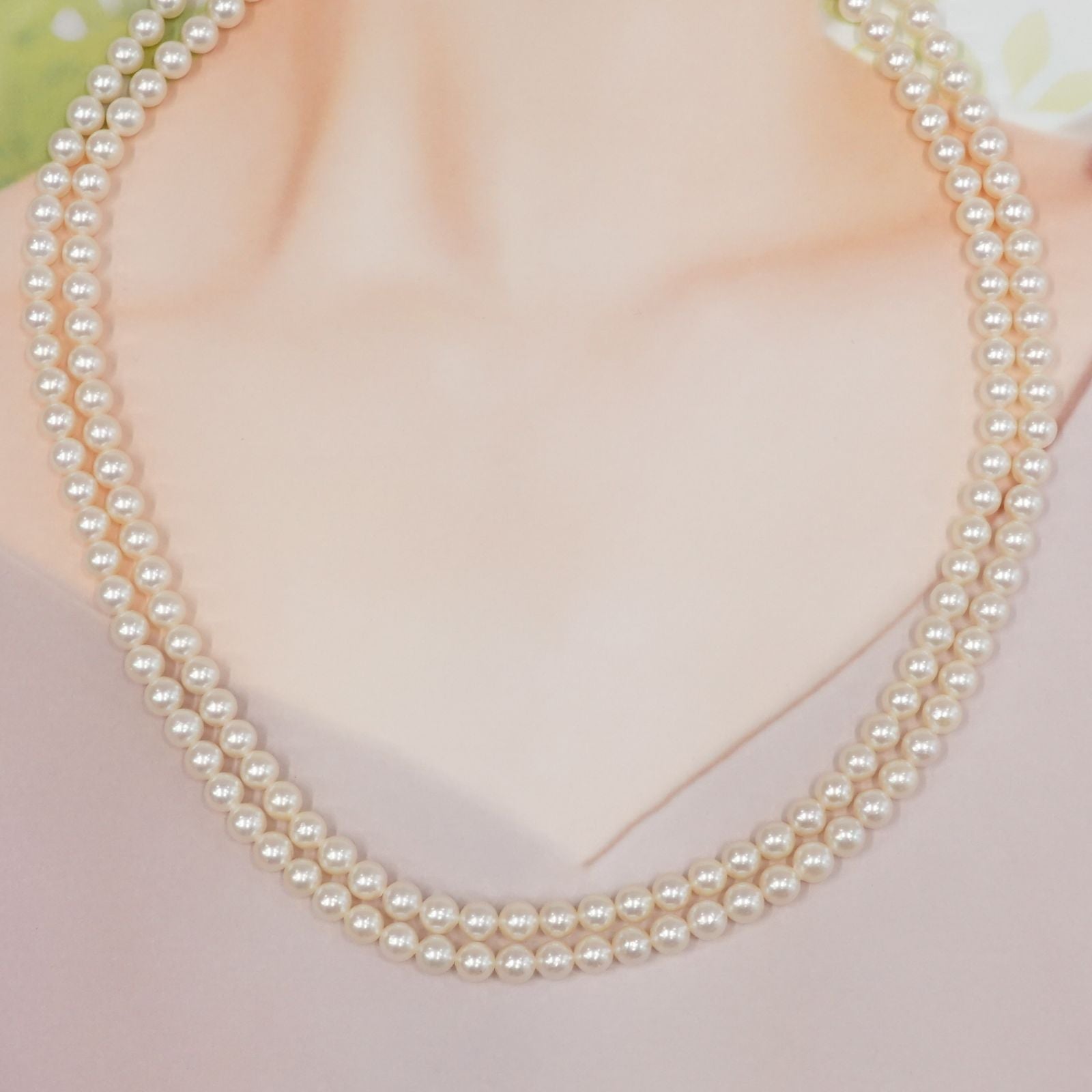 Tasaki Akoya pearl long necklace with 6.5-6.8mm pearls and silver clasp measuring 122cm
