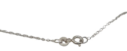 Mikimoto pearl pendant head with 6.5mm pearl on SV925 silver setting measuring 1.5x3 cm displayed on white background