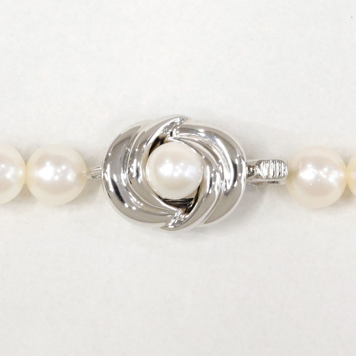 Tasaki Akoya pearl long necklace with 6.5-6.8mm pearls and silver clasp measuring 122cm