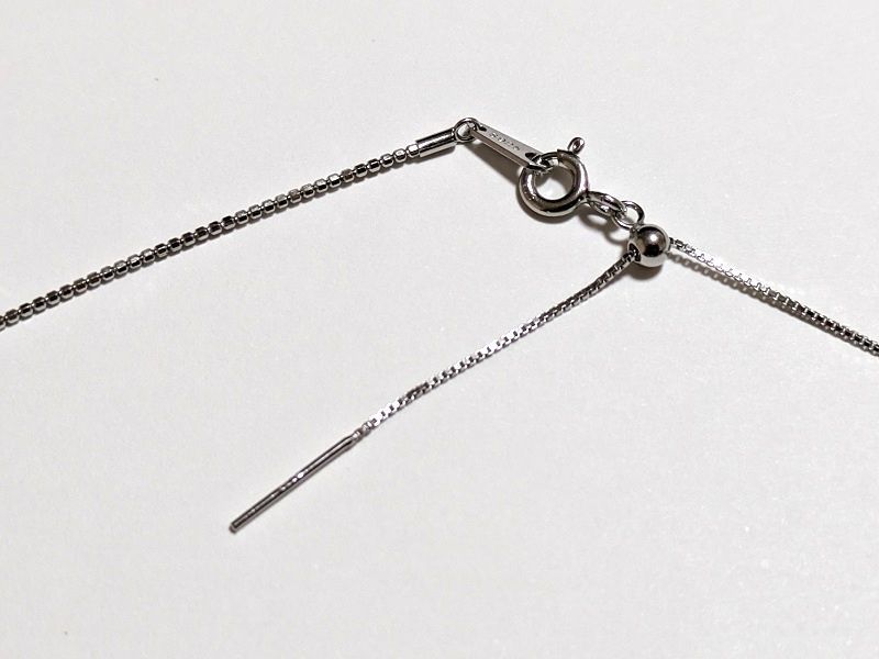 Yamato Akoya Pearl Omega Pearl Push Necklace with 9.5-10 mm white round pearls and thick lacquered wrap