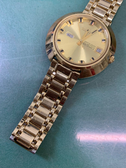 Citizen CRYSTAL SEVEN CUSTOM 6-251684 automatic wristwatch with gold dial showing time and date